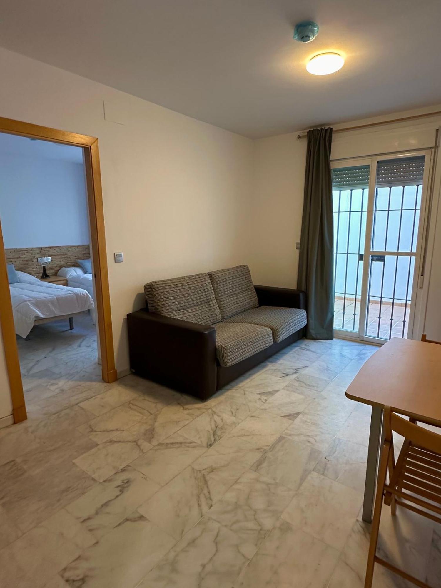 Apartahotel Dona Reyes 奇皮奥纳 外观 照片